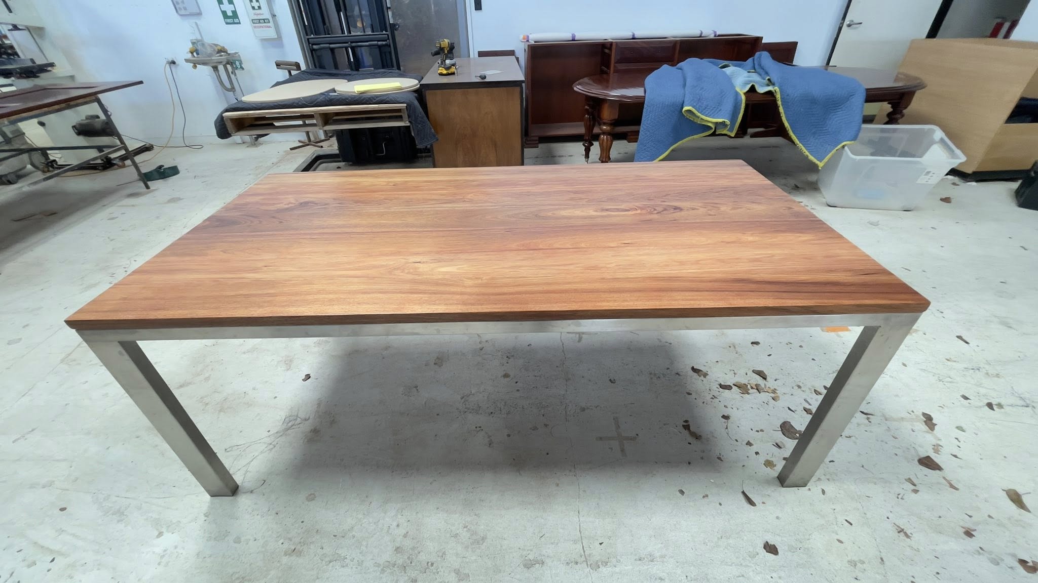 Blackwood Dining Table Makeover - We recently had the pleasure of restoring this beautiful blackwood dining table, originally crafted by Furniture Design Australia. It had suffered water damage, but with some expert care, it’s now looking better than ever! We repaired the damage and finished the table with a high-quality 2PAC acrylic coating — enhancing the natural beauty of the timber while giving it a sleek, durable finish built to last. 🪵 Now it’s ready to shine again in any space!